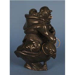 Inuit Sculpture of a Mother and Child Riding a Bird by Noah Elha Look 1980  13 1/2" H. 9 3/4" W.  Go