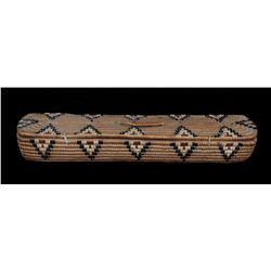 Salish Lidded Feather Storage Basket with Diamond Imbricated Design ca. 1910  17 3/4" L. 4 1/2" W.