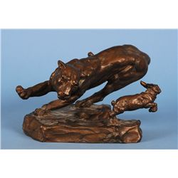 Bronze of a Cougar Chasing a Jack Rabbit by Jack Barney Weaver 12" L. 6 1/2" H.  Fine Condition