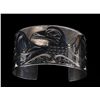 Image 1 : Large Silver Bracelet with Incised Eagle Design by Richard Baker 76 GMS 7 1/8" L. 1 3/4" W.  Fine Co