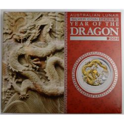 2012 AUSTRAILIAN ONE OUNCE .999 SILVER DRAGON/GOLD GILT WITH BOX AND CERTIFICATE