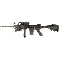 Colt AR-15 Model SP1 Semi-Automatic Rifle with a SureFire Weapon Light, AimPoint Red Dot Sight and S