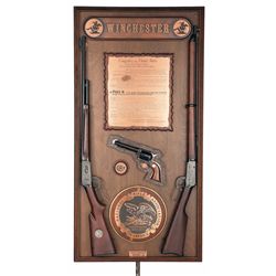 Three NRA Commemorative Firearms with Display Board