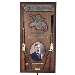 Two Consecutively Serialized Winchester Commemorative Lever Action Long Guns with a Display Board