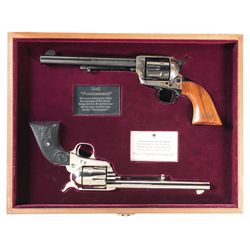 Two Commemorative Colt Single Action Army Revolvers with a Shared Presentation Case