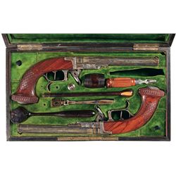 Magnificent Cased Pair of French Engraved Gold Inlaid Underhammer Percussion Pistols by Gosset