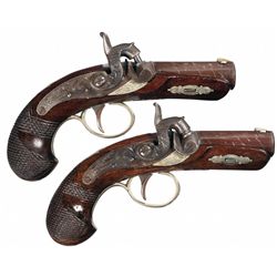 Exceptional Pair of Engraved and Silver Banded Henry Deringer Percussion Pistols
