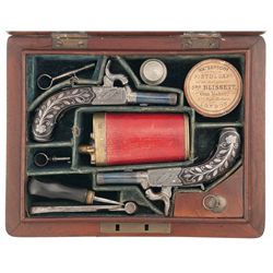 Unique Cased Set of Attractive Miniature Vest Pocket Pistols with Silver Accents and Accessories