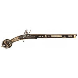 Attractively Engraved and Gold Accented Flintlock Pistol with Ivory Inlaid Ball Pommel Stock