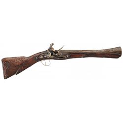 Flintlock Blunderbus with Ornately Carved Stock and Extensive Silver Overlays and Inlays