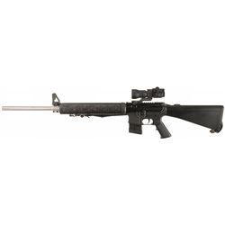 ArmaLite M15A4 Semi-Automatic Rifle with Aimpoint Sight and Extra Magazines