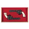 Image 1 : Magnificent Cased Pair of Consecutively Serial Numbered Engraved Gold Inlaid Colt Python Commemorati