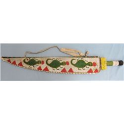 African sheath & sword, covered with glass beads & cowries (?) 39” long,
