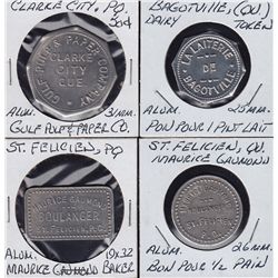 Lot of 4 Quebec Trade Tokens.