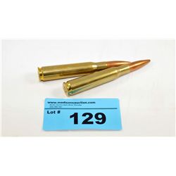 2 50caliber brass bullets