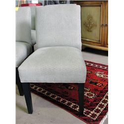 Sage green upholstered contemporary dining room