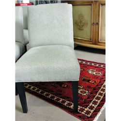Sage green upholstered contemporary dining room