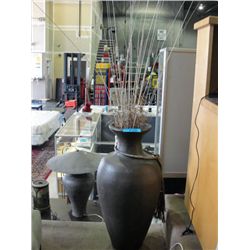 Decorative ceramic vase with dried sticks