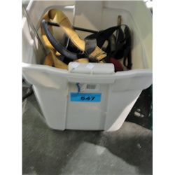 Beige rubbermaid storage bin of tools hardware