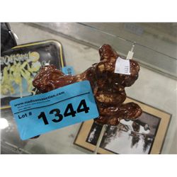 Art pottery dog figurine