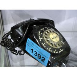 Black rotary telephone