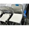 Image 1 : Lot of 5 white and grey stacking chair s