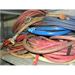 Shelf lot of assorted air hose line