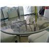 Image 1 : Large round glass top patio table