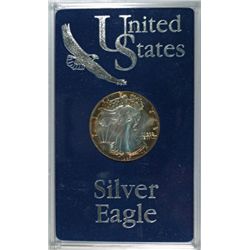 1987  US silver Eagle nice toning  est $45-$50