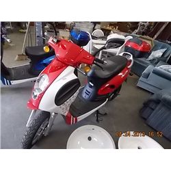 SCOOTER - ELECTRIC - RED DEMONSTRATION MODEL - 133KM - retail ~$1795.00 - comes with luggage rack an