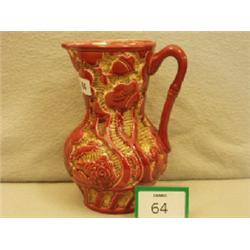 Beswick studio jug with leaf and vine decoration, impressed no. 694, 10" tall £30 - 50...