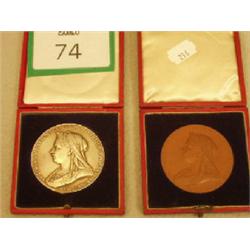 Pair of Victorian medallions, one solid silver the other mint condition, cased £60 - 80...
