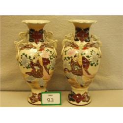 Pair of oriental vases with dragon and handpainted decoration, 12" high £40 - 60...