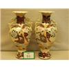Image 1 : Pair of oriental vases with dragon and handpainted decoration, 12" high £40 - 60...