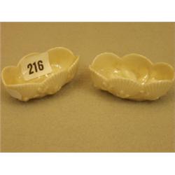 Pair of Belleek first period salts £80 - 120...