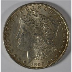 1899 MORGAN SILVER DOLLAR, AU