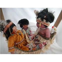 Indian Dolls and a Canoe