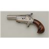Image 4 : Colt Third Model Derringer in .41 rimfire  caliber, nickel plated, wood grips. The  Derringer retain