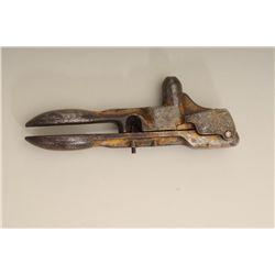 Early spoon-type loading tool with traces of  original gold paint for the .45-70 cartridge  (Winches