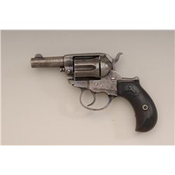 Colt Lightning Storekeepers Model in .38  caliber with factory 2 ½” barrel, traces of  blue and case