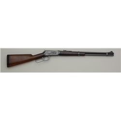 Winchester Model 94 lever action carbine, .30  W.C.F. cal., 20” barrel, blue finish, custom  engrave