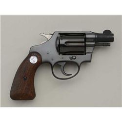 Colt Detective Special DA revolver, .38  Special cal., 2” barrel, blue finish,  checkered wood medal