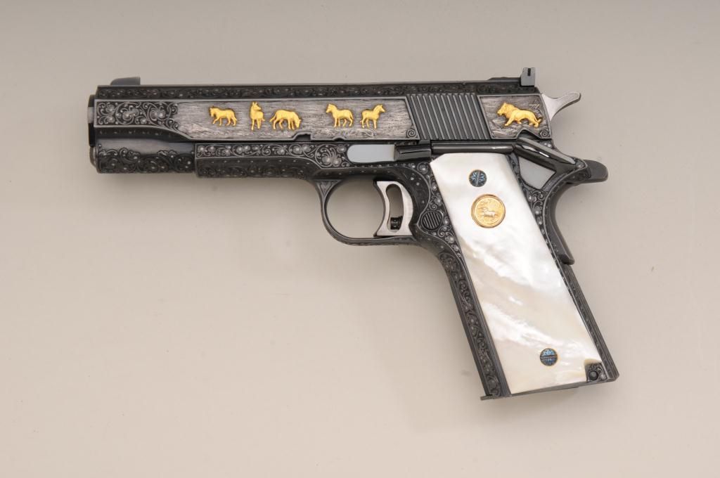 Colt Gold Cup National Match .45 ACP caliber semiautomatic pistol fully and finely ornate scroll Colt Gold Cup National Match .45 ACP caliber semiautomatic pistol fully and finely ornate scroll
