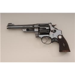 Smith & Wesson Registered Model DA revolver,  .357 Magnum cal., 6" barrel, blue finish,  checkered w
