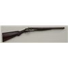 Image 1 : L.C. Smith SxS exposed hammers shotgun, 12  gauge, 18-1/2” cut-down Damascus barrels,  checkered woo