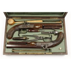 Massive pair of percussion pistols by Clough  and Sons of Bath, England in  French fitted  case with