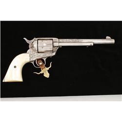 Colt single action Army revolver in . 45 long  Colt calibers with 7 ½ inch barrel, factory  engraved