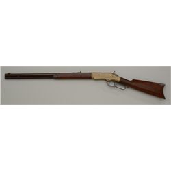 Winchester model 1866 lever action rifle late  production series showing iron butt plate  and conver