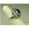Image 4 : Spectacular 14 karat white gold ladies custom  made ring set with a fine oval Tanzanite  weighing ap