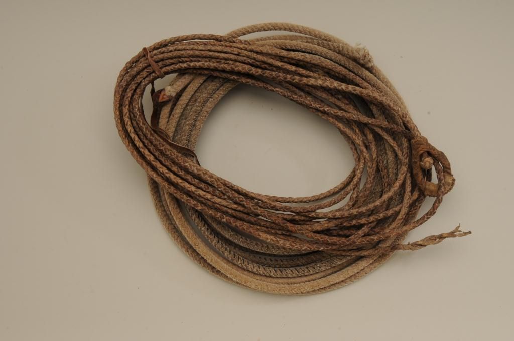 Lot of two old Western era ropes. Number one is a braided leather Riata ...